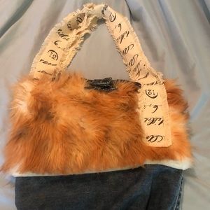 Upcycled Demin and faux fur handbag.
